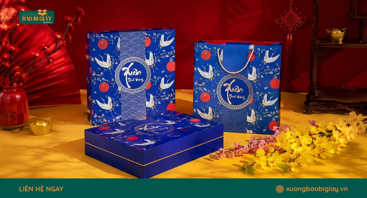 Hộp giấy bánh kẹo Tết đong đầy sắc xuân với thiết kế bắt mắt, thích hợp đóng gói quà Tết và sản phẩm bánh kẹo.